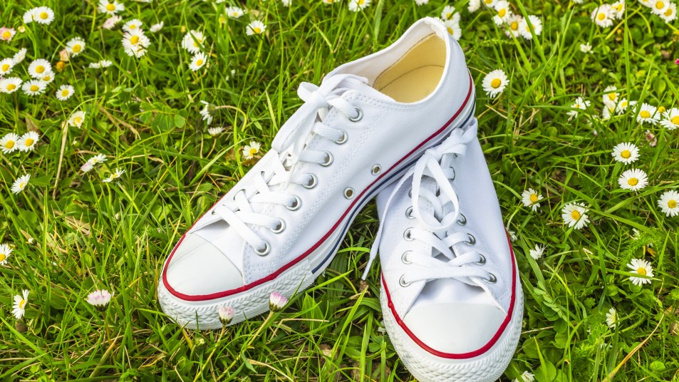 white sneakers on grass