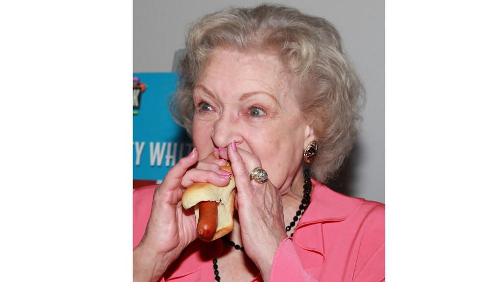 betty white eating a hot dog