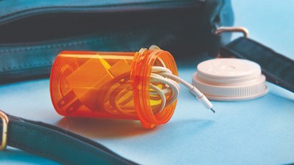 A pill bottle can be used to organize cords