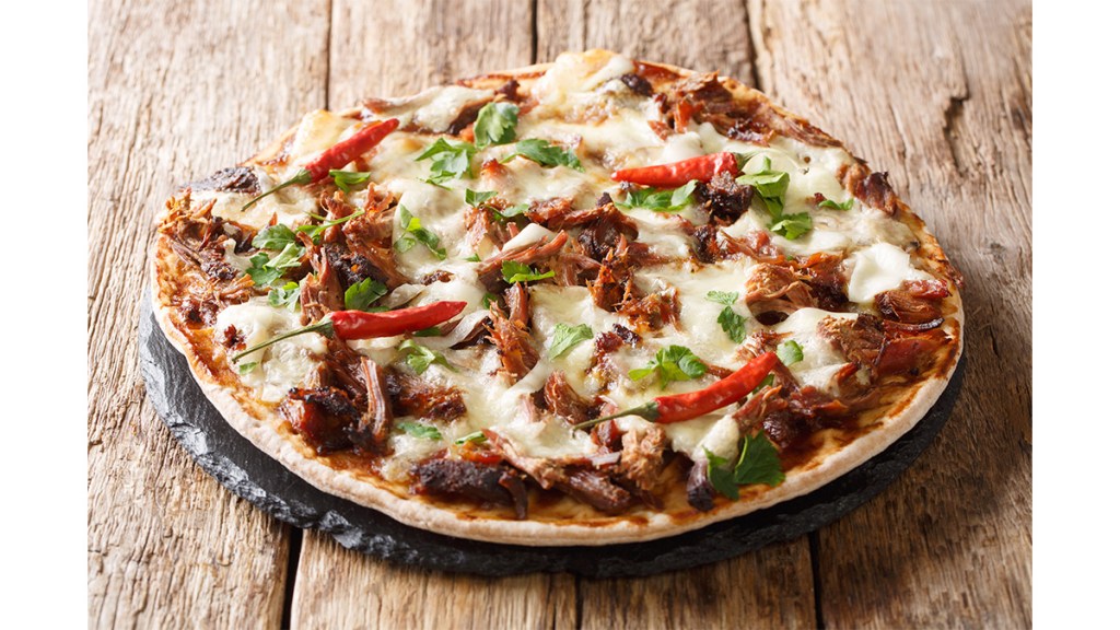 A recipe for Cheddar-Brisket Pizza as part of a guide on how to reheat the meat