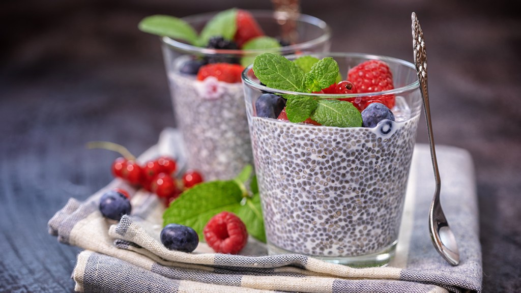 chia pudding with berries on top; best snacks for weight loss