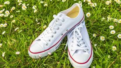 white sneakers on grass