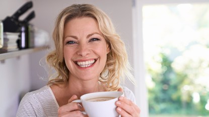 woman drinking coffee: Health benefits of one cup of coffee a day