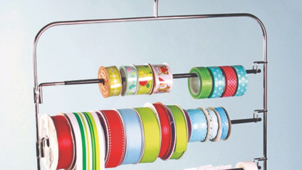 Showing how to store ribbon on a pants hanger