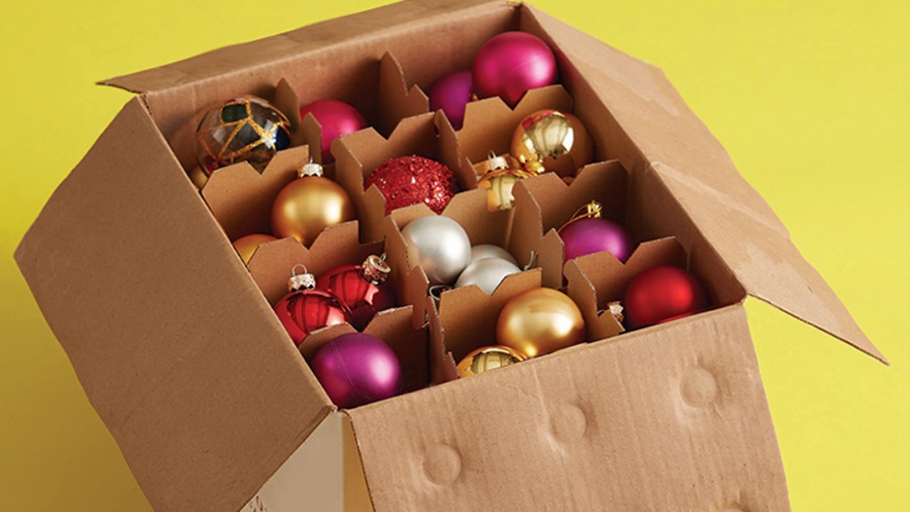 ornaments tucked away in a wine carton with dividers: How to store ornaments