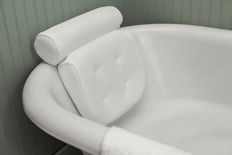 https://www.firstforwomen.com/wp-content/uploads/sites/2/2019/08/best-bath-tub-pillow.png?w=750