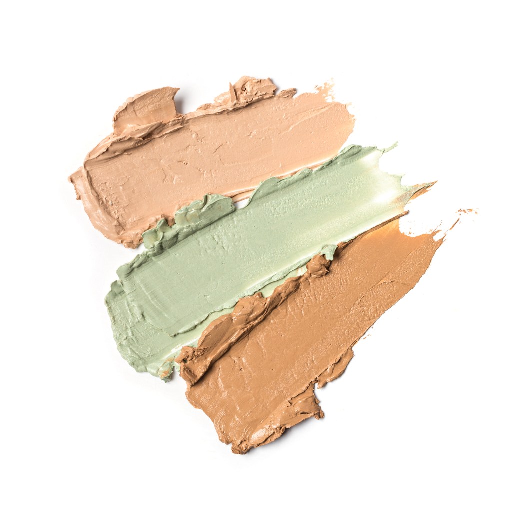swatch of green and tan foundation