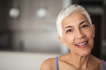Older woman posing for photo