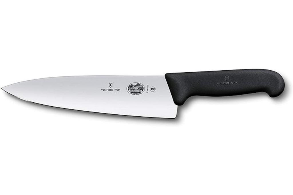 A chef's knife on a white background