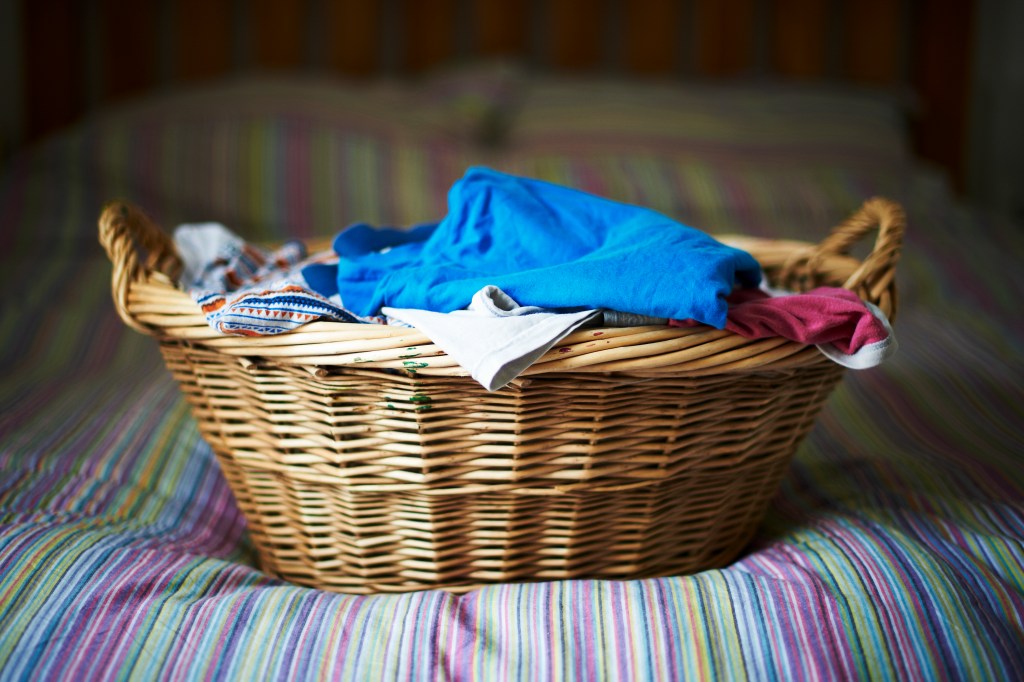 Laundry basket full of clothes