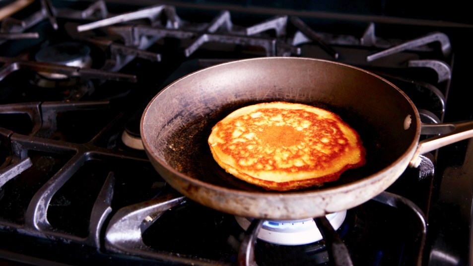 Pancake cooking on a stove