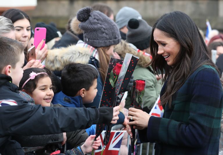 Meghan Markle receives roses from children