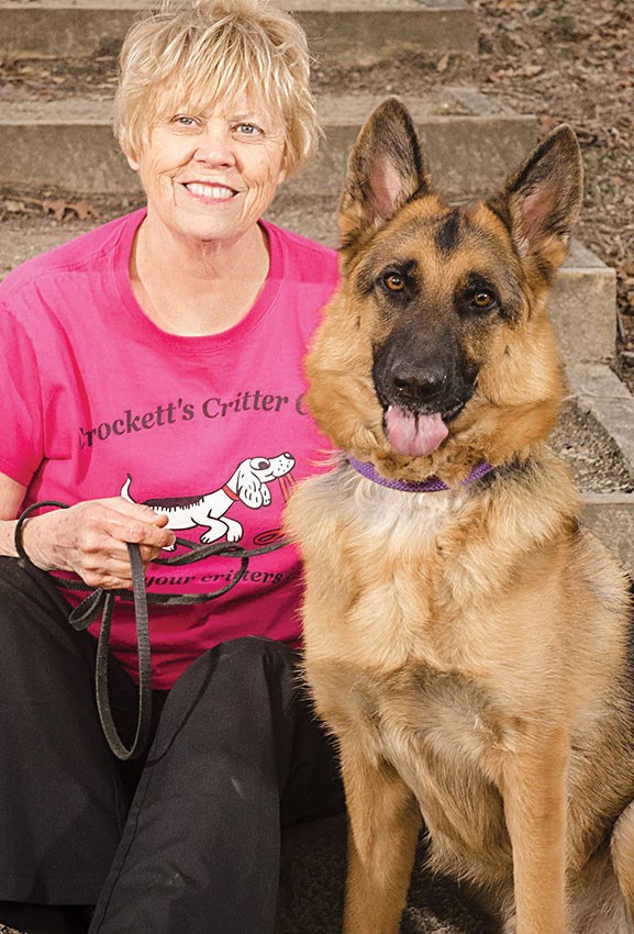 Jeanne Crockett, 73, Newburgh, NC with a German Shepherd