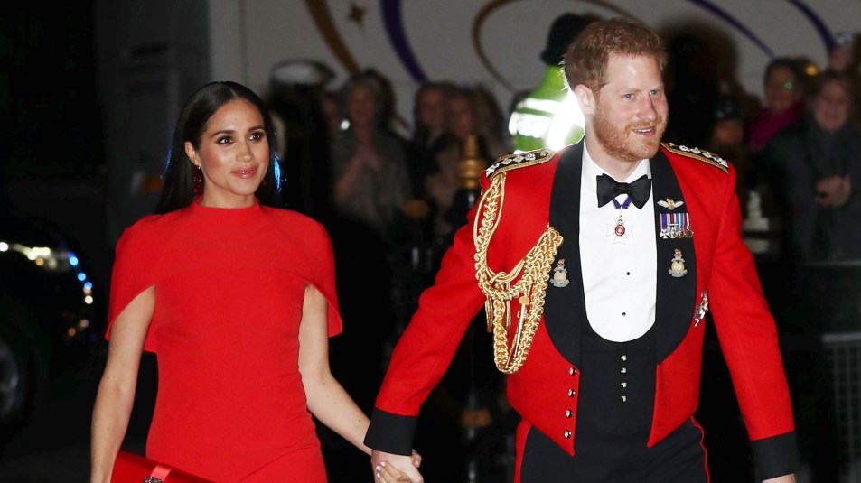 harry and meghan in red
