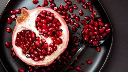Open pomegranate and seeds