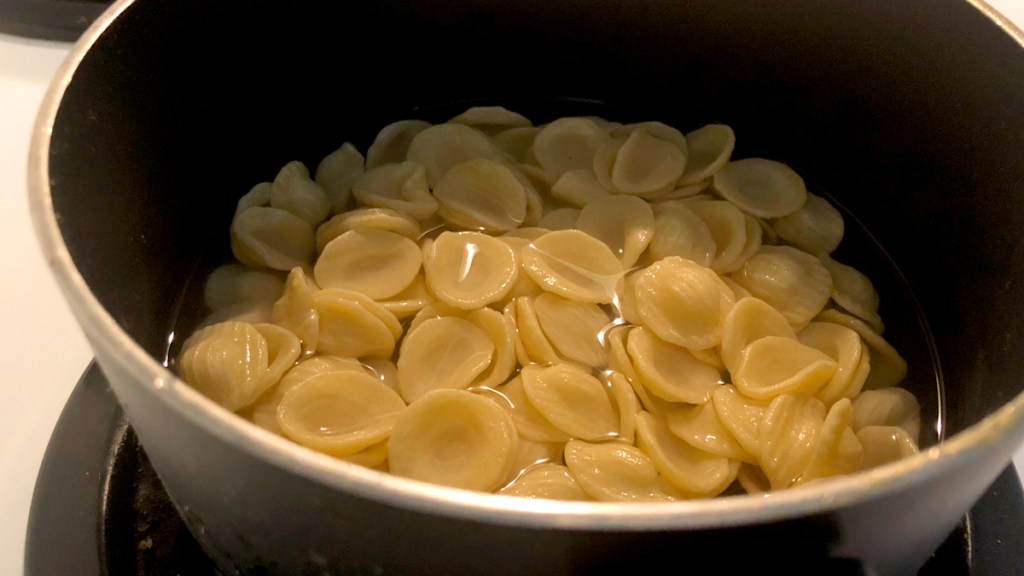 Pasta and water in a pot