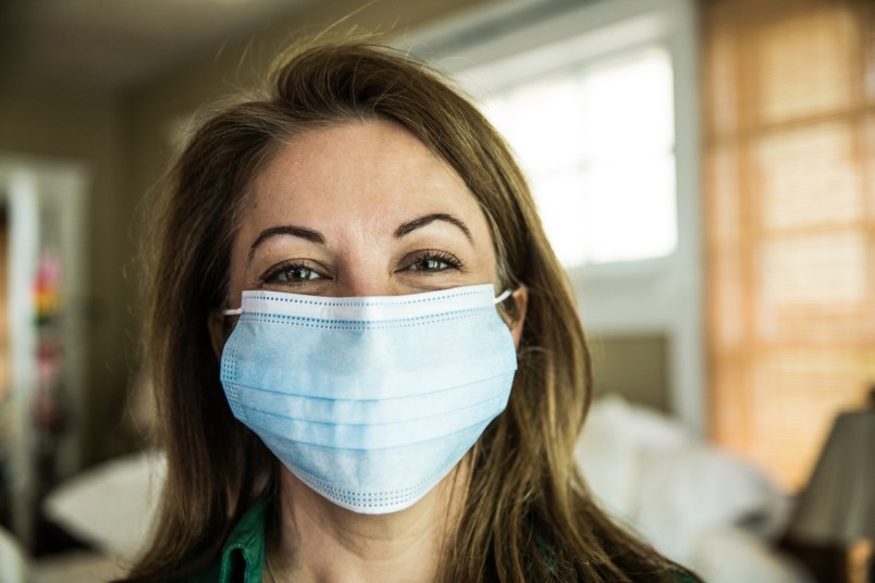woman wearing surgical mask