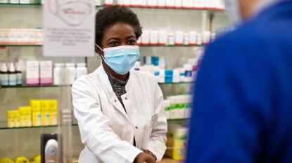 Pharmacist working with a mask on
