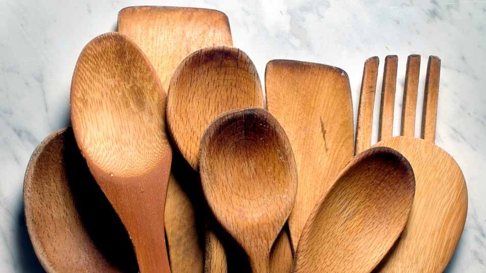 Variety of wooden spoons on a granite counter