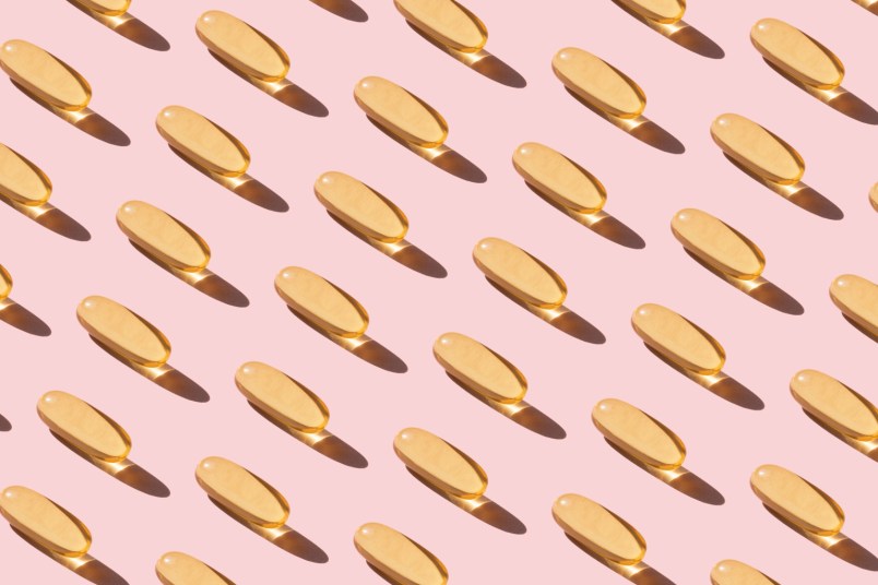 pill capsules on pink background