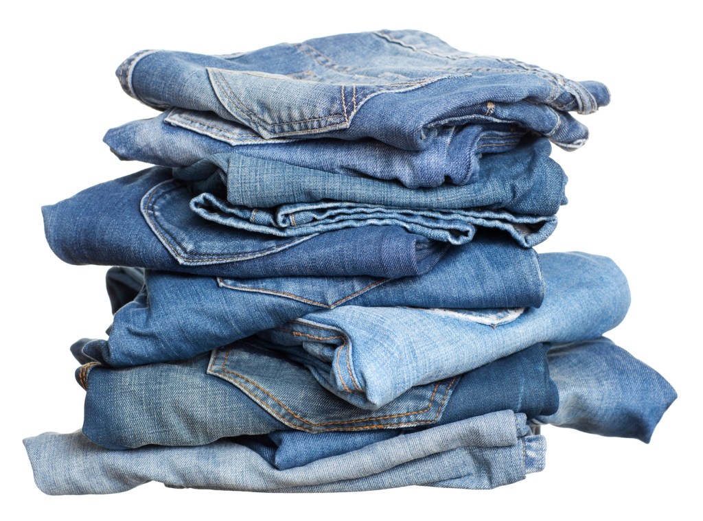 pile of folded jeans, for white vinegar uses