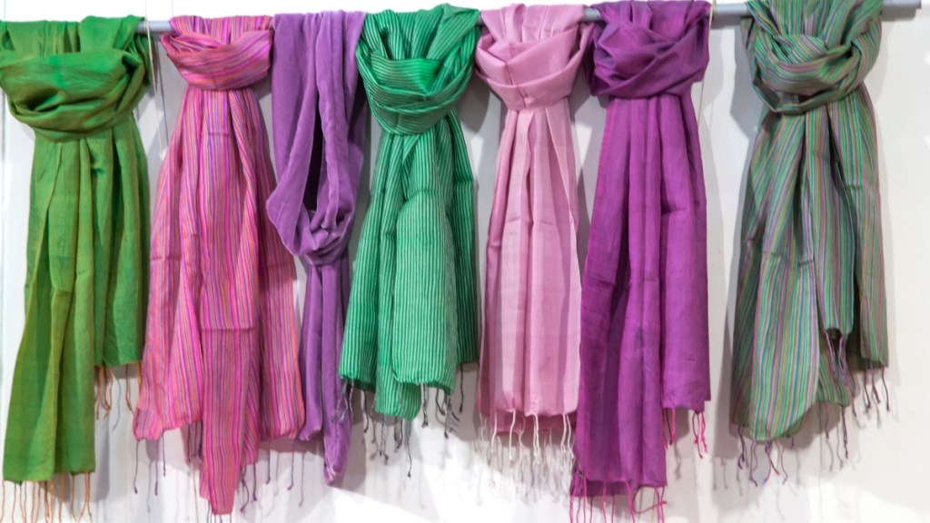 Hang scarves on a towel rod as a closet organizer DIY