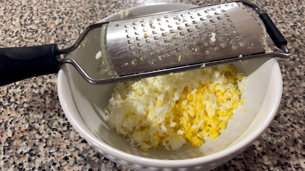 Grated egg in a bowl