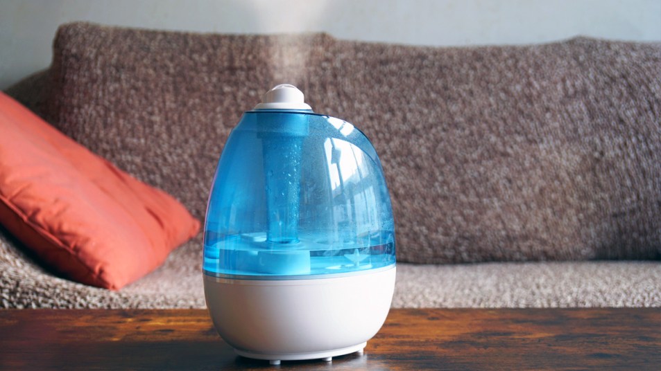 A humidifier on a coffee table