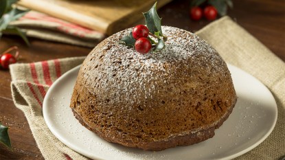 Figgy pudding served on a plate