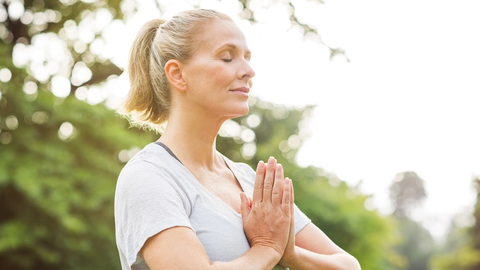 Woman engaging in an easy 5-minute mindfulness meditation