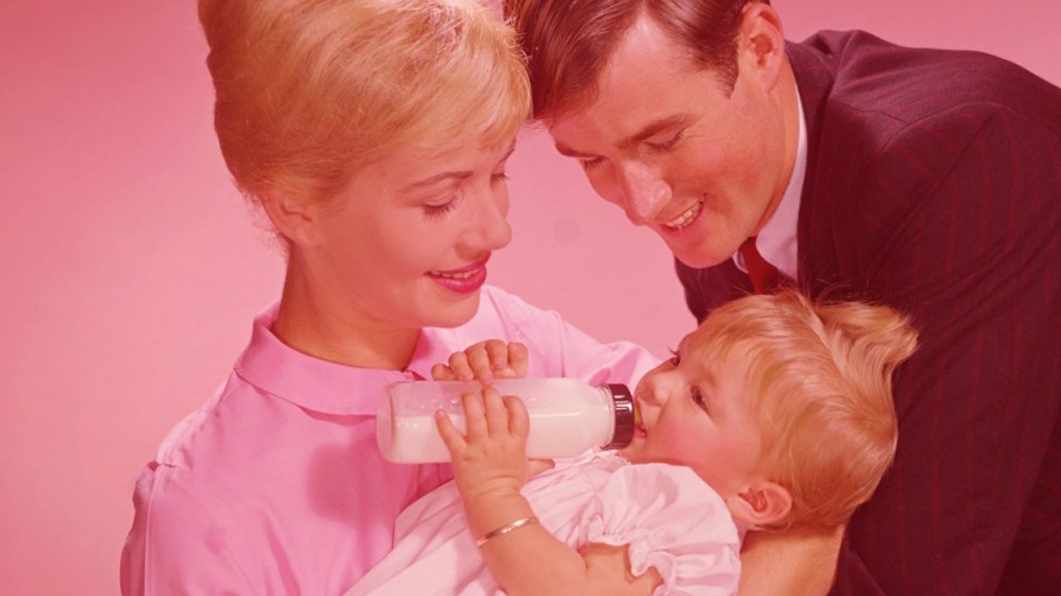 Vintage photo of parents with baby girl