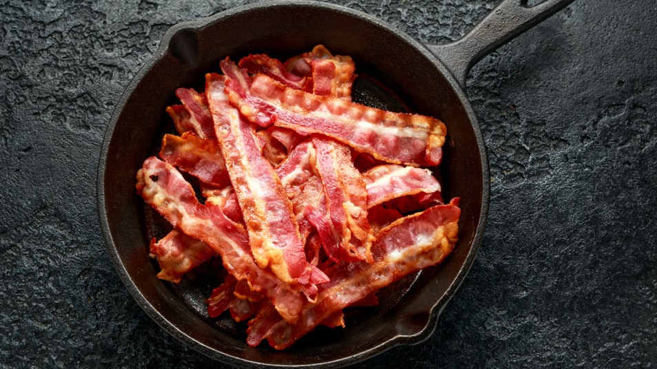 Skillet with pile of bacon