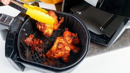 Air fryer with messy BBQ chicken