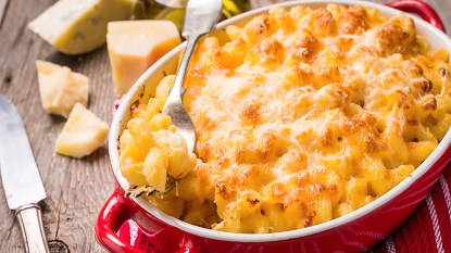 A dish of baked mac and cheese as part of guide on how to reheat it