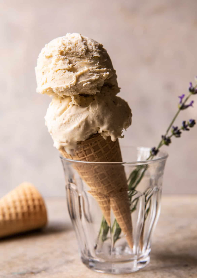 vanilla olive oil ice cream cone in a glass with lavender sprig