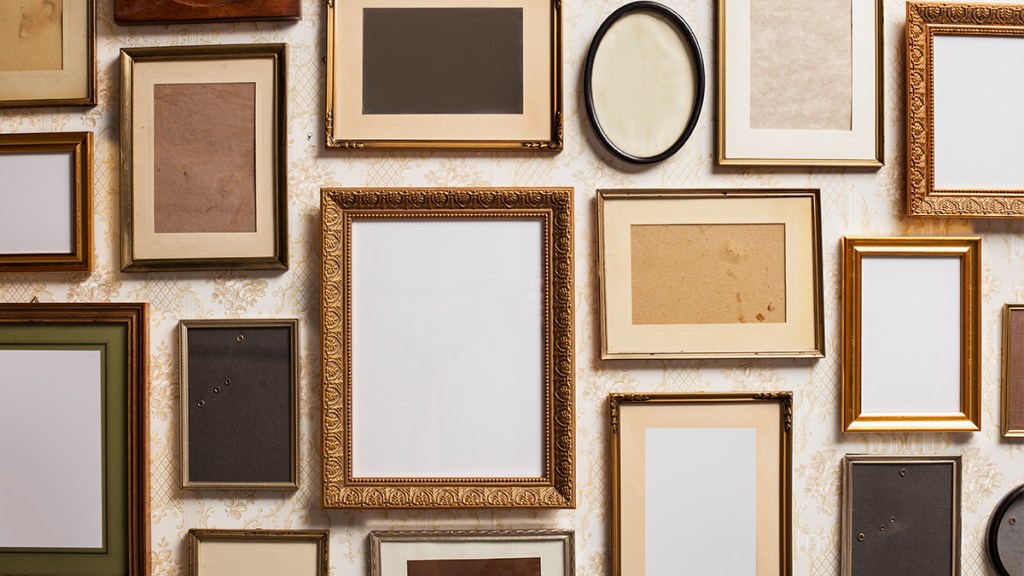 photo frames arranged on a wall: uses for paper bags