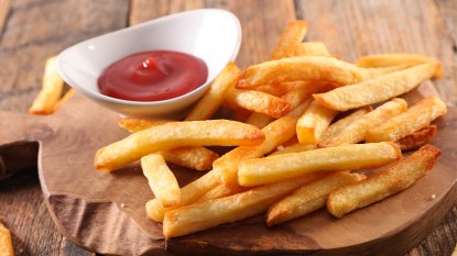 Plain fries with ketchup as part of a guide on how to reheat them