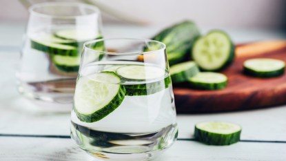 Glasses of water with cucumber slices
