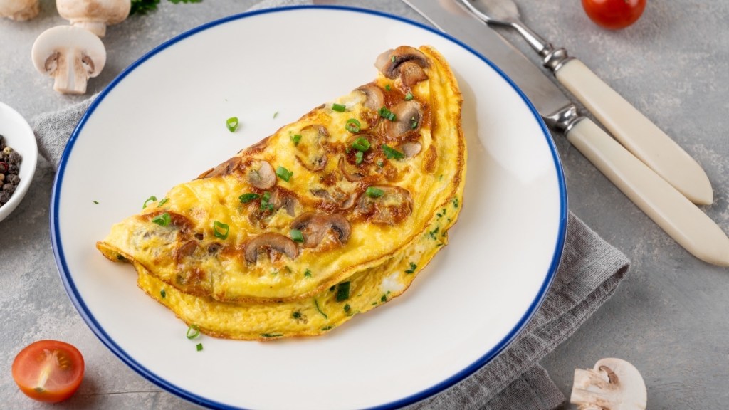 Omelet on a plate, which is a serotonin boosting food