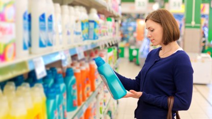 Woman shopping for laundry detergent