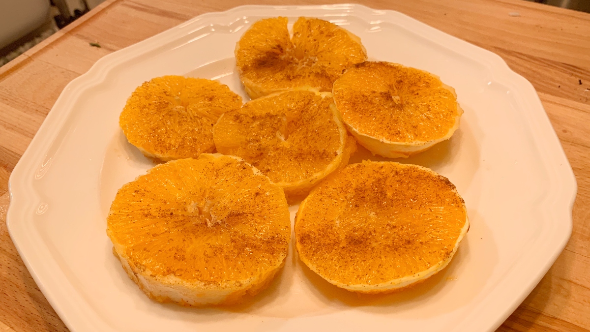 air fryer roasted oranges on a white plate