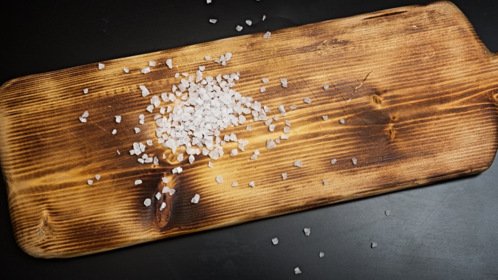 Removing stains from cutting boards is one of many uses for salt
