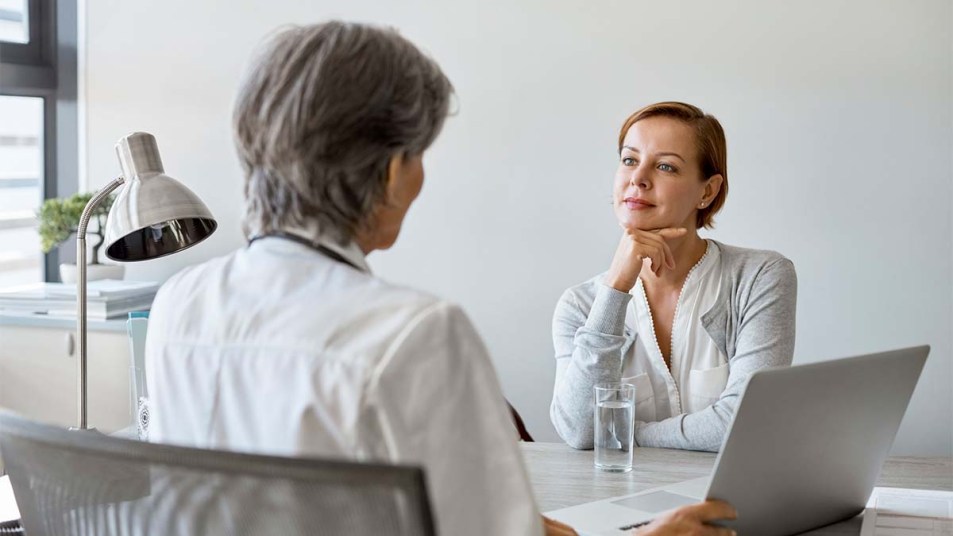 Woman speaking with her doctor