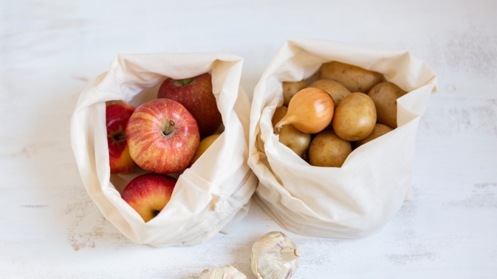 Two bags of apples and onions, which contain quercetin to improve heart health