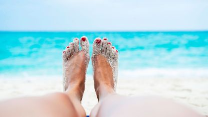 sandy feet at the beach