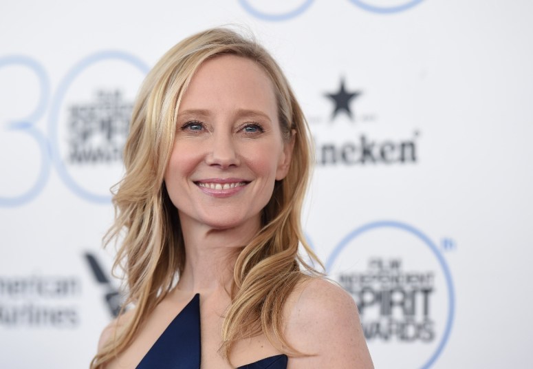 Anne Heche smiling on the red carpet