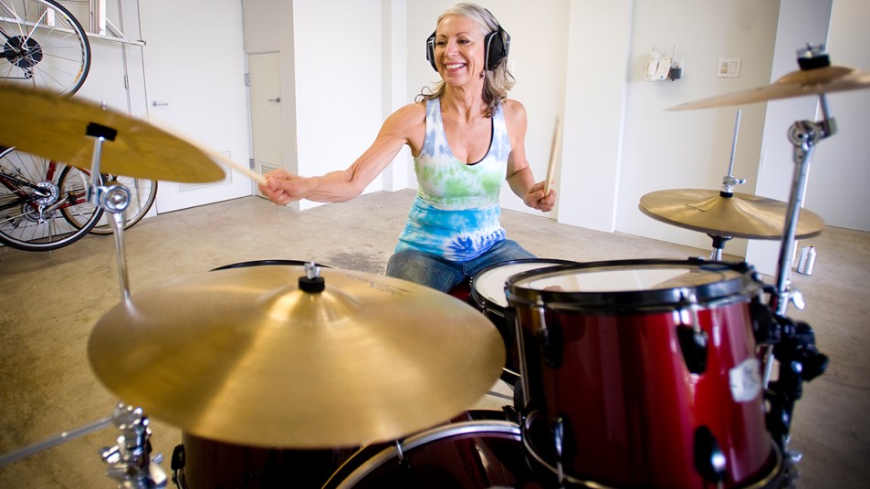 Woman Playing the Drums