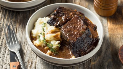 Beef teriyaki short ribs served with pan juices and mashed potatoes