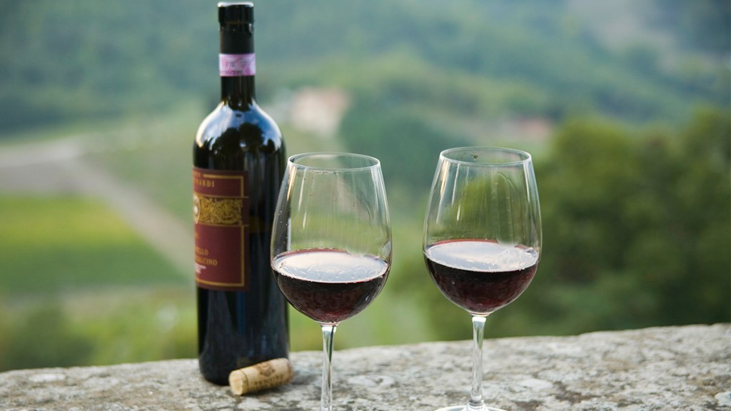 bottle and 2 glasses of red wine (can the Mediterranean diet help you lose weight)
