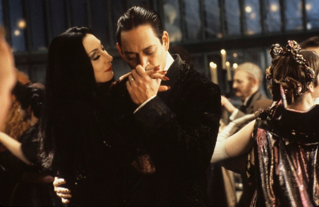 Anjelica Huston and Raul Julia in 'The Addams Family,' 1991